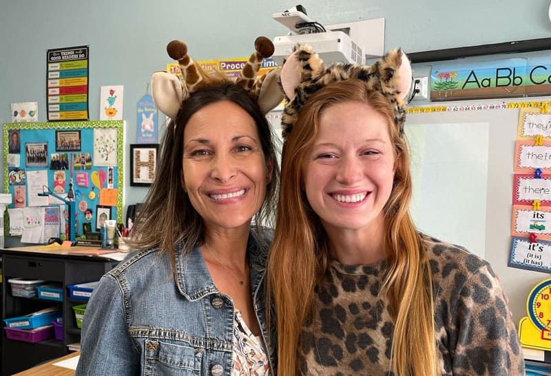 DMP second grade teachers smiling and wearing cute animal headbands